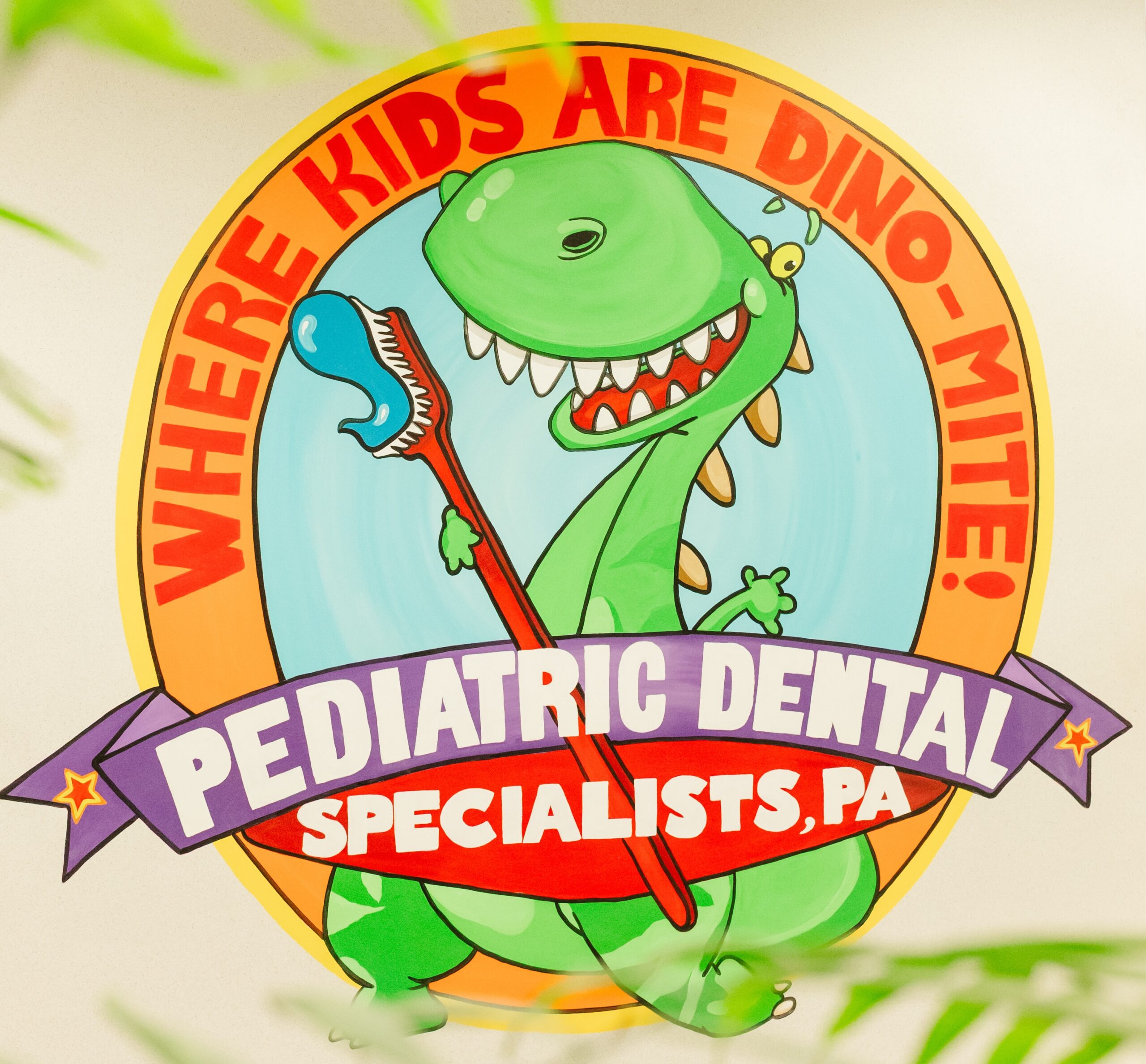 Dino Kids Office logo on wall